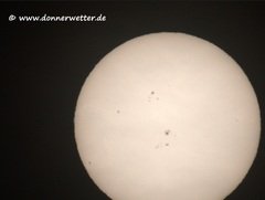 Aktive Sonne, bunter Himmel